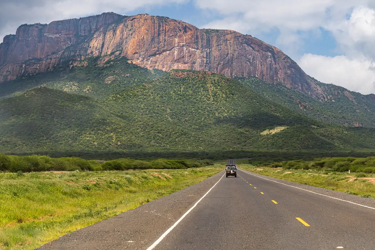 Paved A2 road leading toward Mount Ololokwe in northern Kenya